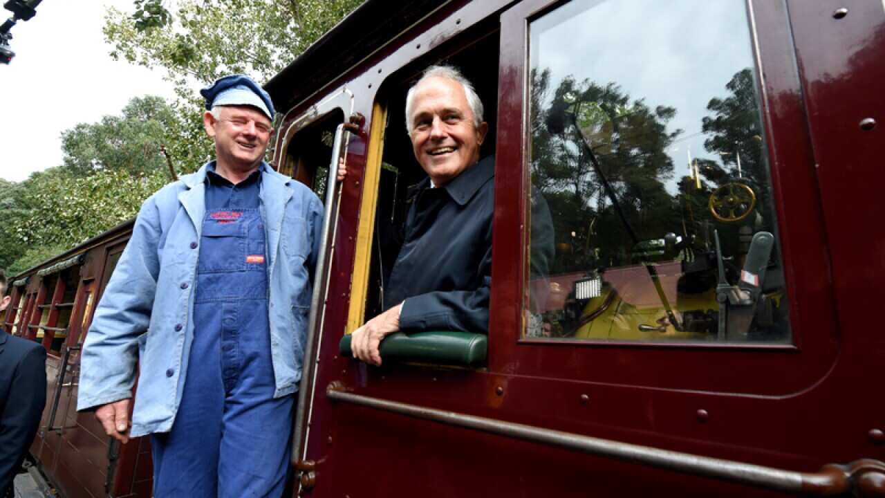 Minister Malcolm Turnbull rides on the Puffing Billy Railway