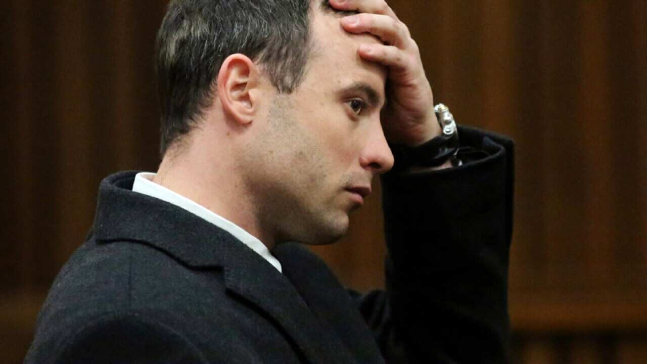 Oscar Pistorius sits in court in Pretoria
