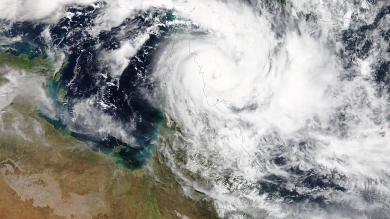 A NASA satellite photo shows Cyclone Trevor crossing the Queensland coast
