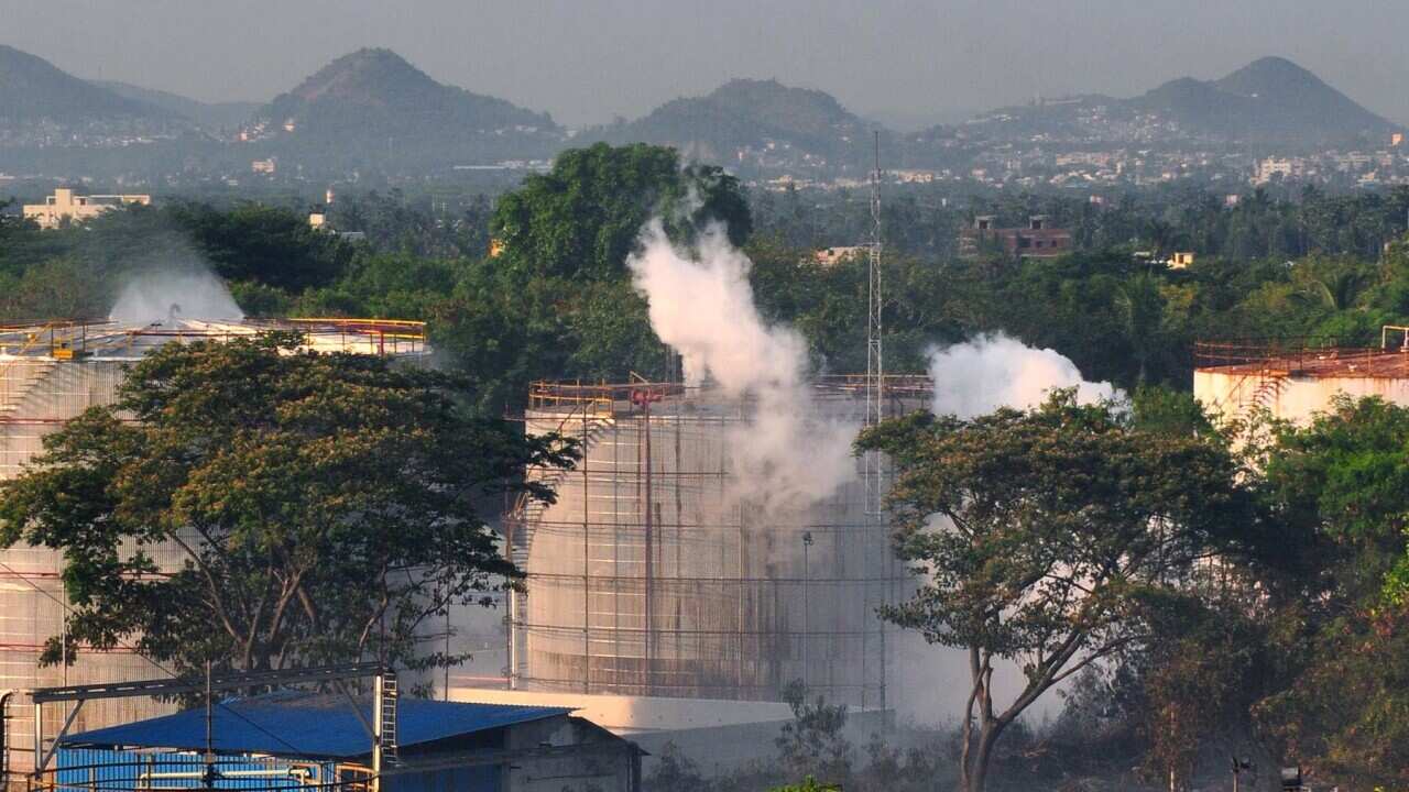 Smoke rising from a chemical plant, the site of a toxic gas leakage, in Andhra Pradesh state, southern India