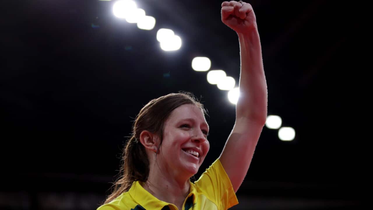 Michelle Bromley celebrates during a table tennis match for Australia at the 2020 Tokyo Olympics