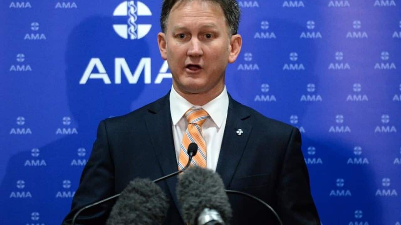 AMA President Dr Michael Gannon speaks to the media