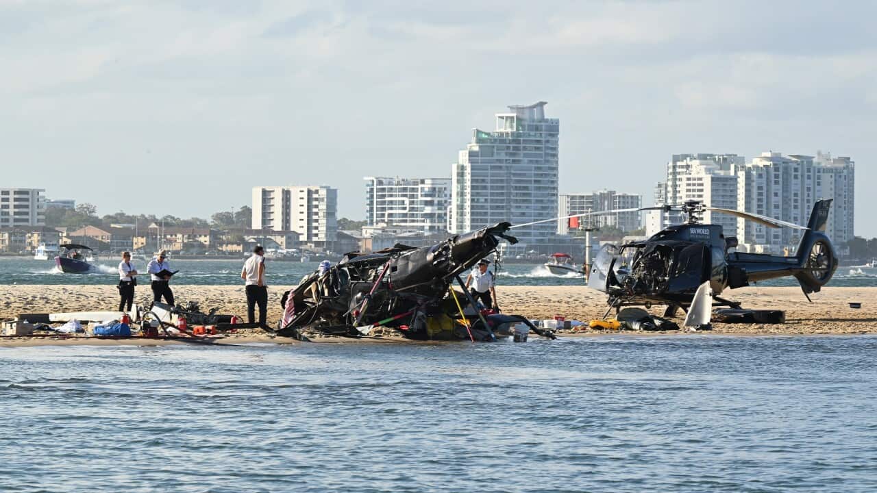 The wreckage of two helicopters after a crash on the Gold Coast in January (AAP)