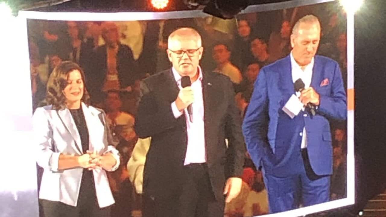 Prime Minister Scott Morrison in prayer at the Hillsong Conference. 