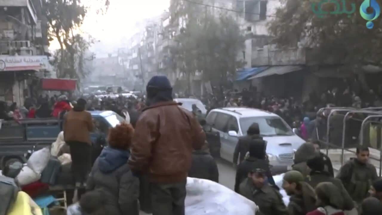 civilians gathering for evacuation from eastern Aleppo