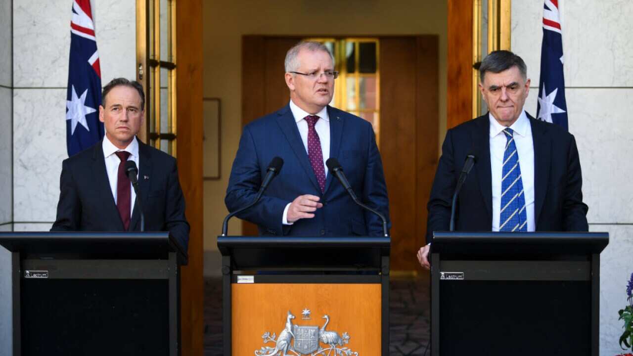 Health Minister Greg Hunt, Prime Minister Scott Morrison and Chief Medical Officer Brendan Murphy.