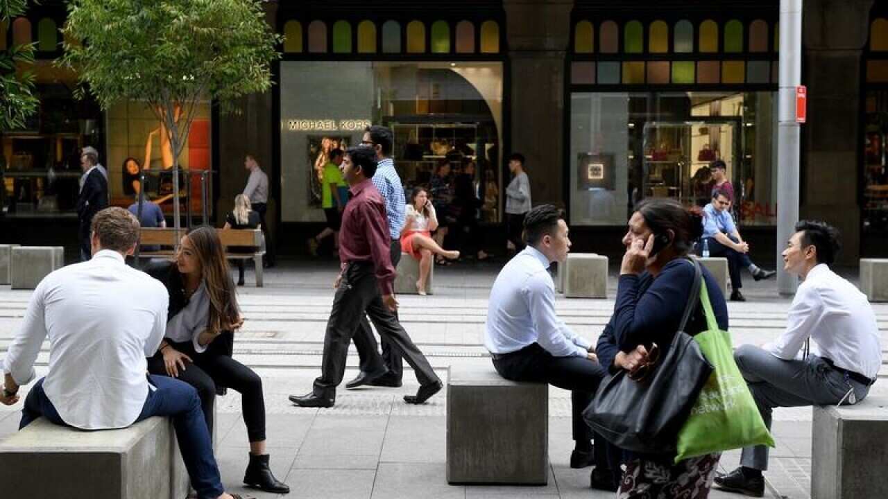 Pedestrians are seen on George Street.
