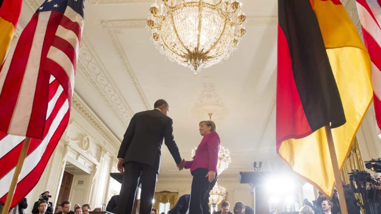 US President Barack Obama (L) with Chancellor of Germany Angela Merkel