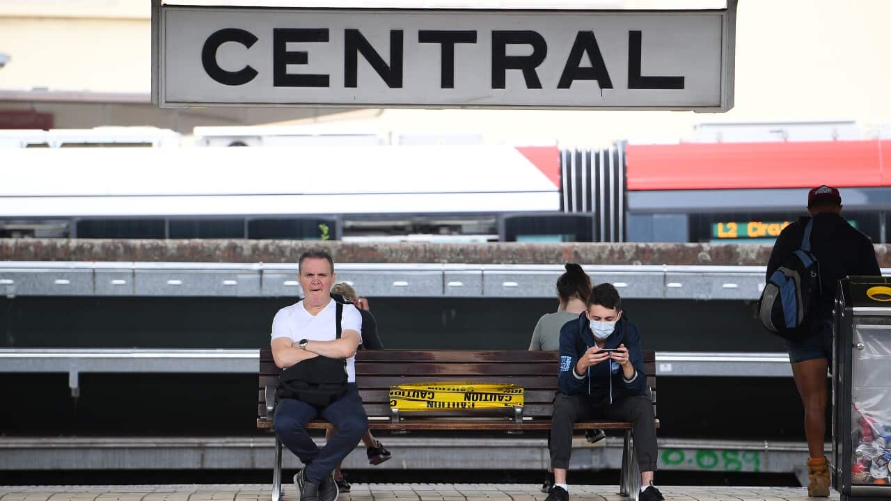 Commuters at an unprecedentedly quiet Central Station in Sydney.