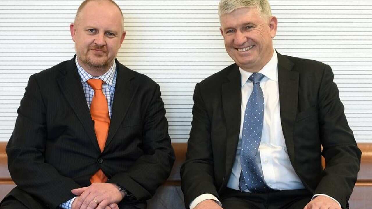 Chairman of M2 Group Craig Farrow and Charman of Vocus David Spence