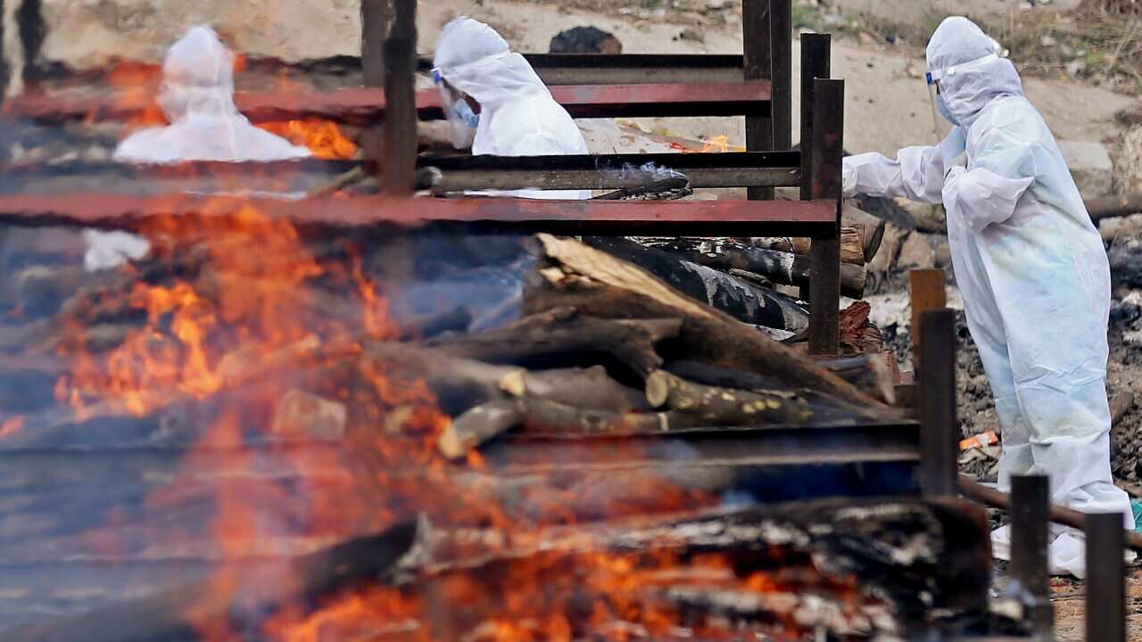 A mass cremation ground for COVID-19 victims in Giddenahalli on the outskirts of Bangalore, India.