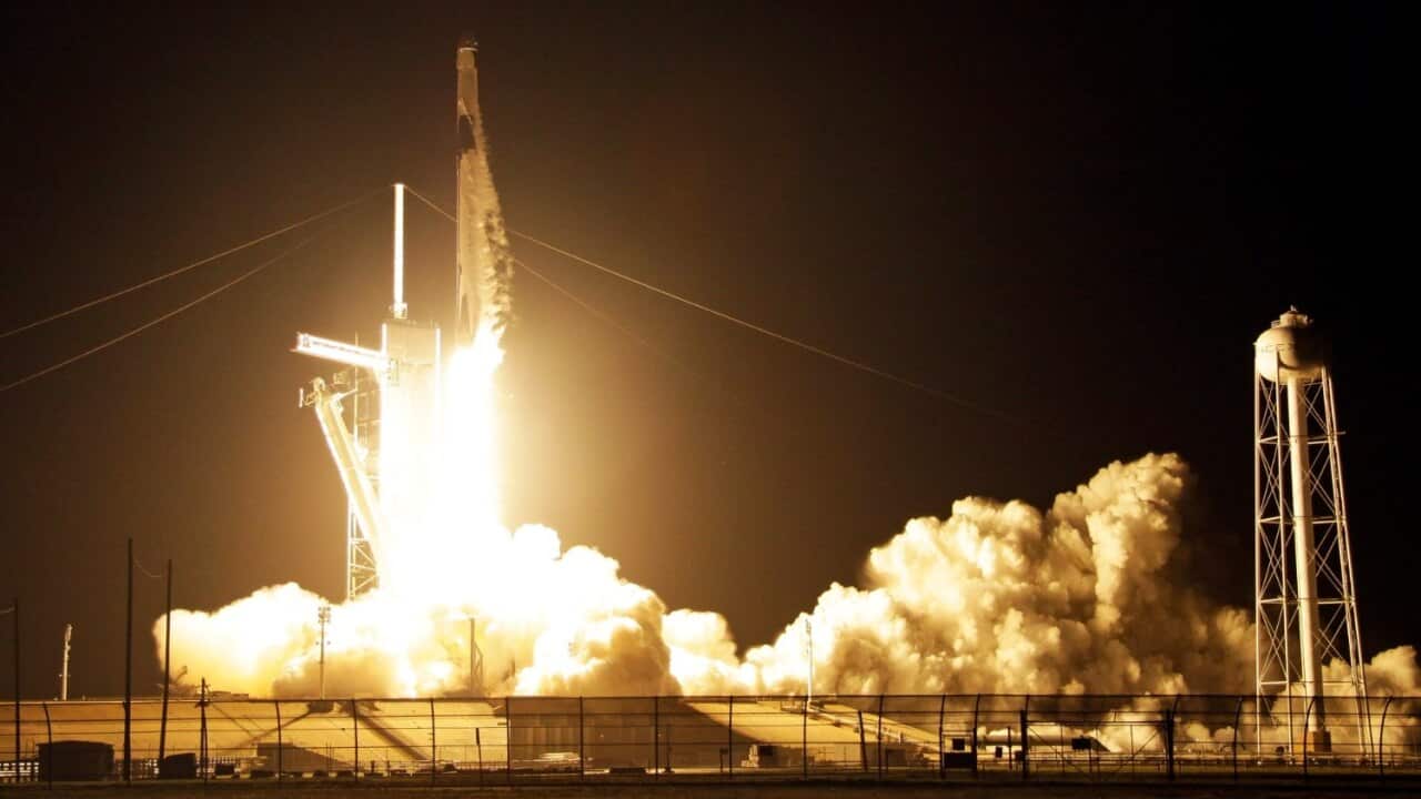 A SpaceX Falcon 9 rocket with a demo Crew Dragon spacecraft lifts off from pad 39A on an uncrewed test flight to the International Space Station