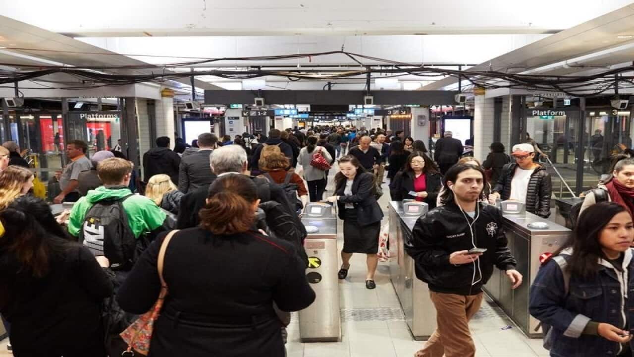 Commuters at Sydney's Town Hall railway station.