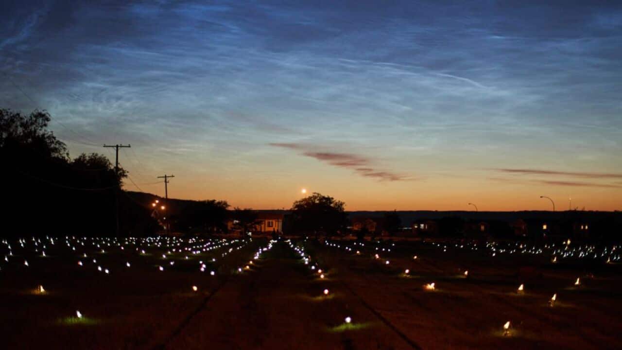 Solar lights and flags mark the spots where 751 human remains were discovered at the site of the former Marieval Indian Residential School in Saskatchewan