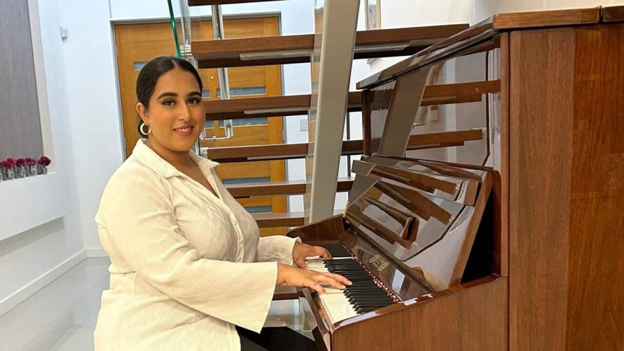 Sukhleen playing Piano 16x9.jpeg