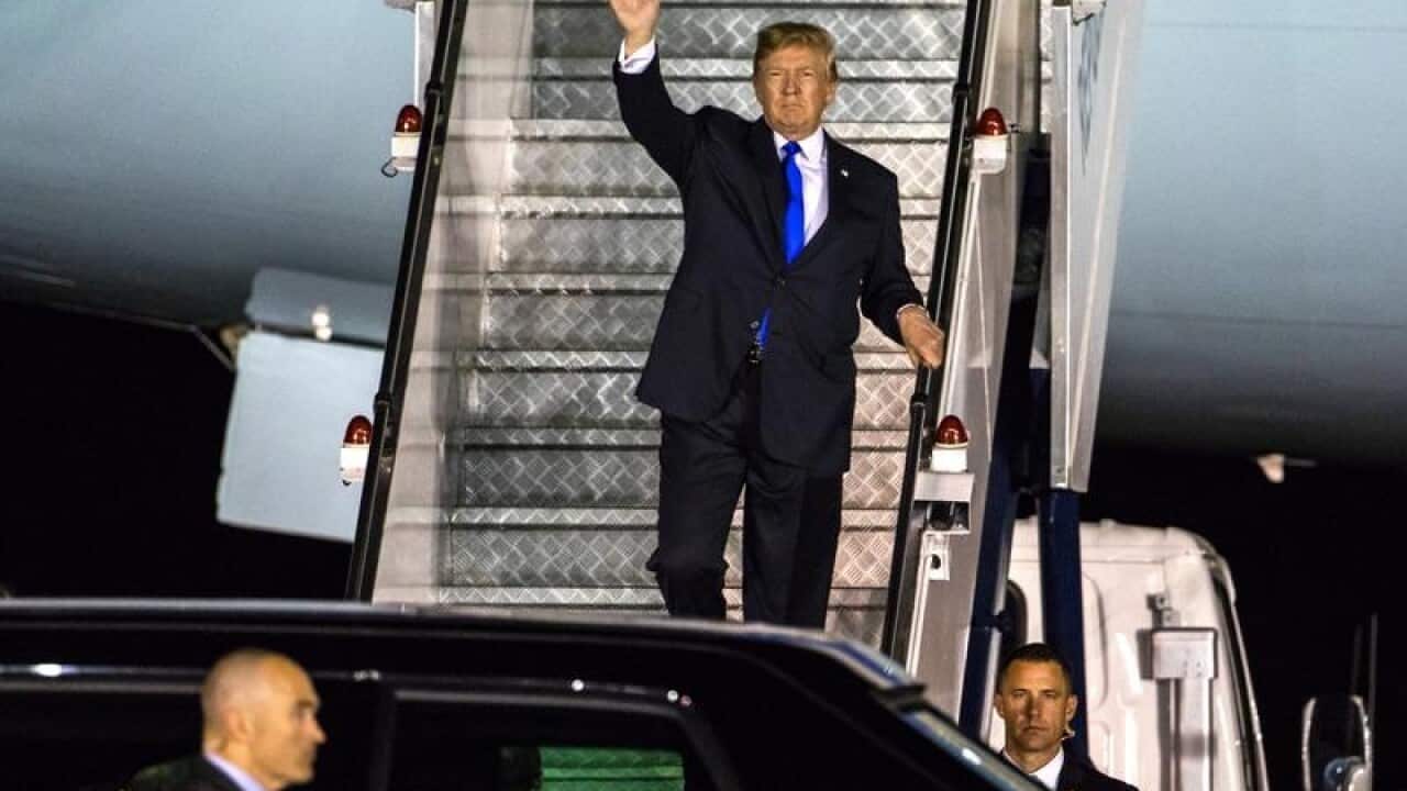 Donald J. Trump walks off Air Force One