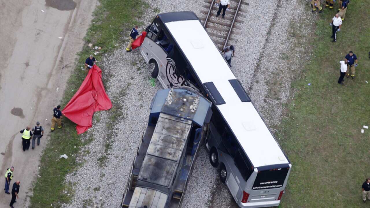 A train and bus at the scene of an accident in Biloxi, Mississippi