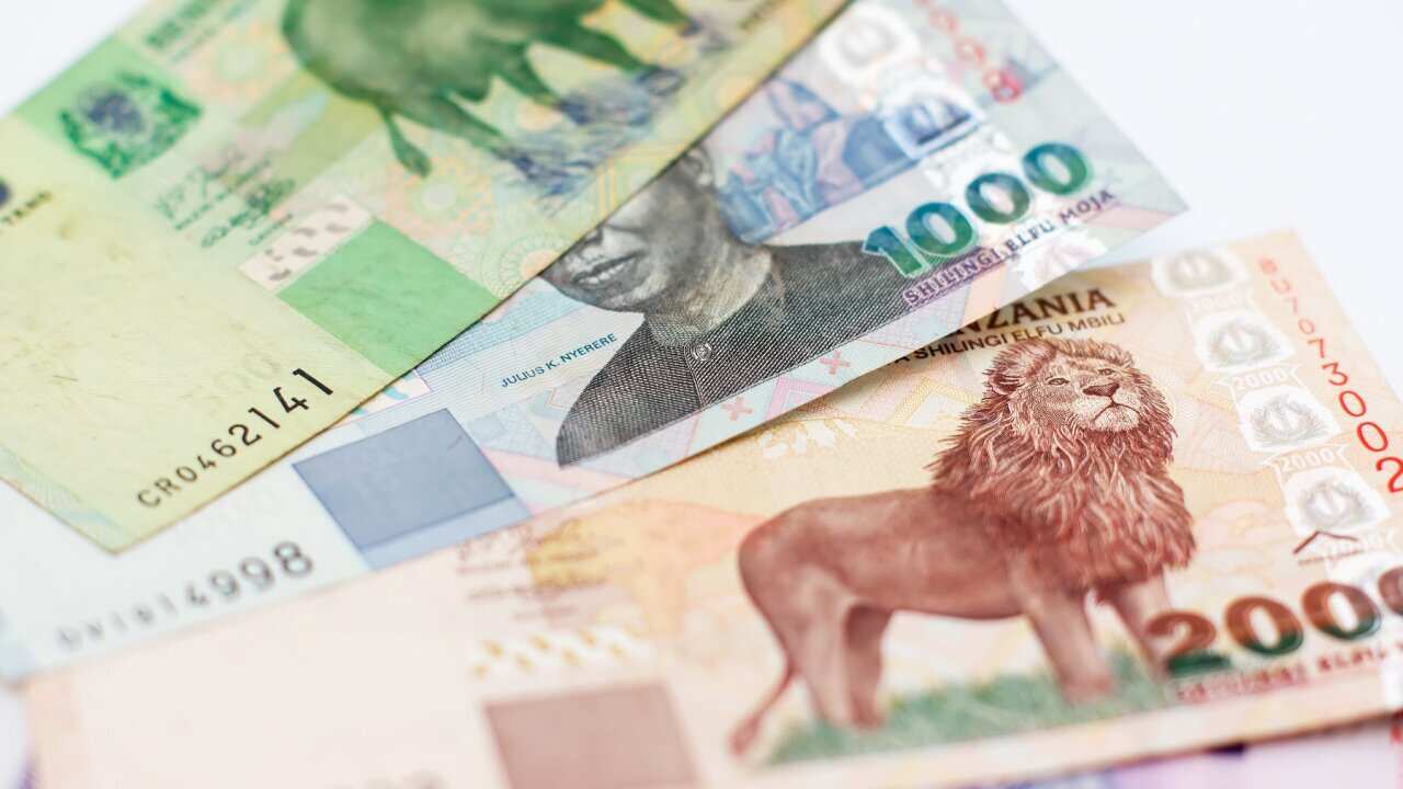 Top view of banknotes of Tanzanian shillings different denominations close up. Currency Of Tanzania