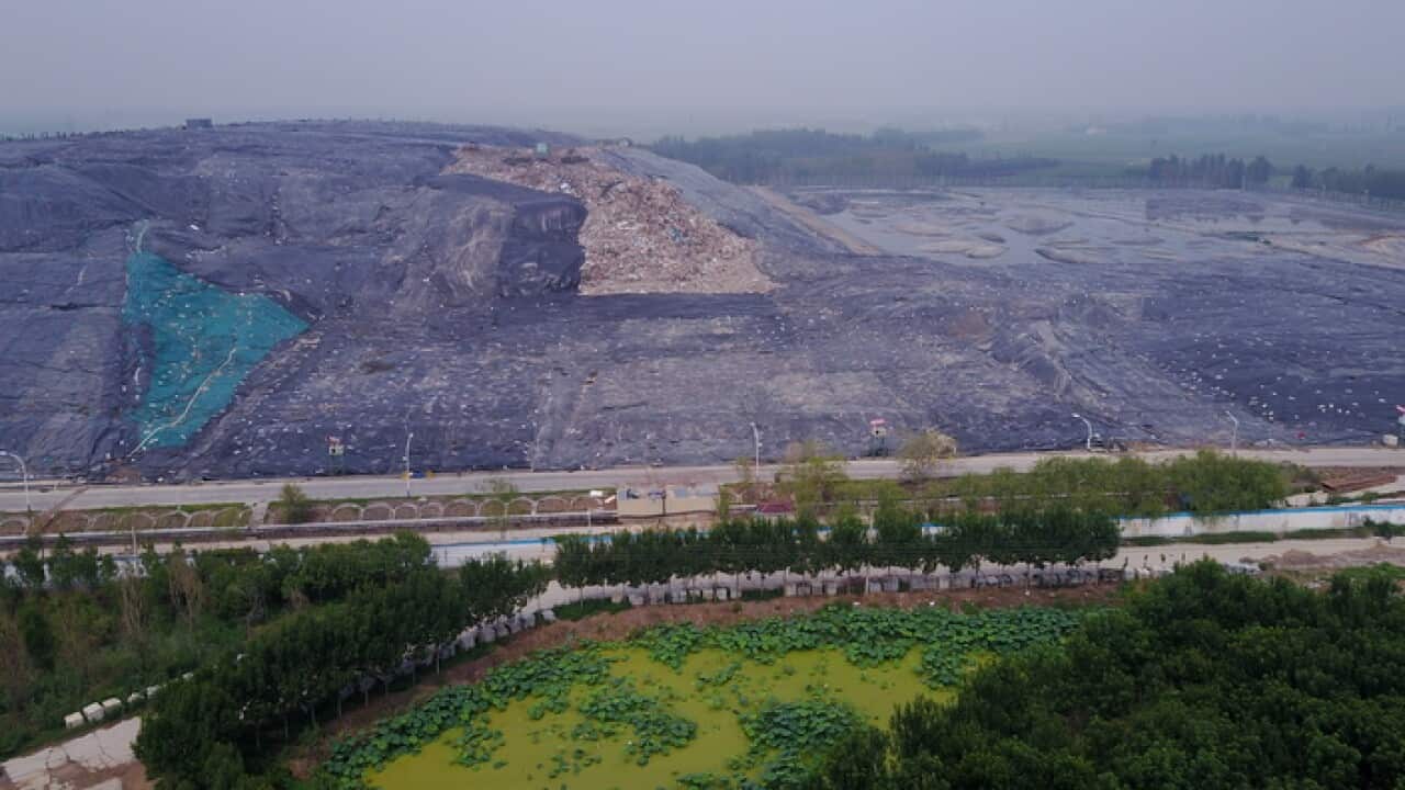 Aerial view of a garbage dump near Yellow River in Jiyang county, Ji'nan city, east China's Shandong province, 10 July 2019.
