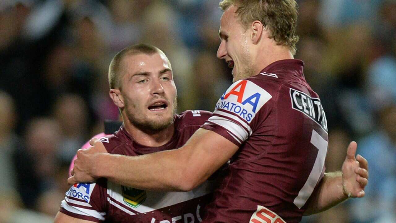 Sea Eagles' Daly-Cherry Evans (right) congratulates Kieran Foran.