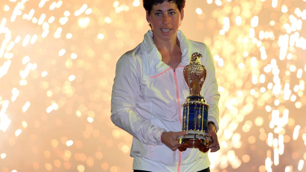Carla Suarez Navarro of Spain poses with her trophy