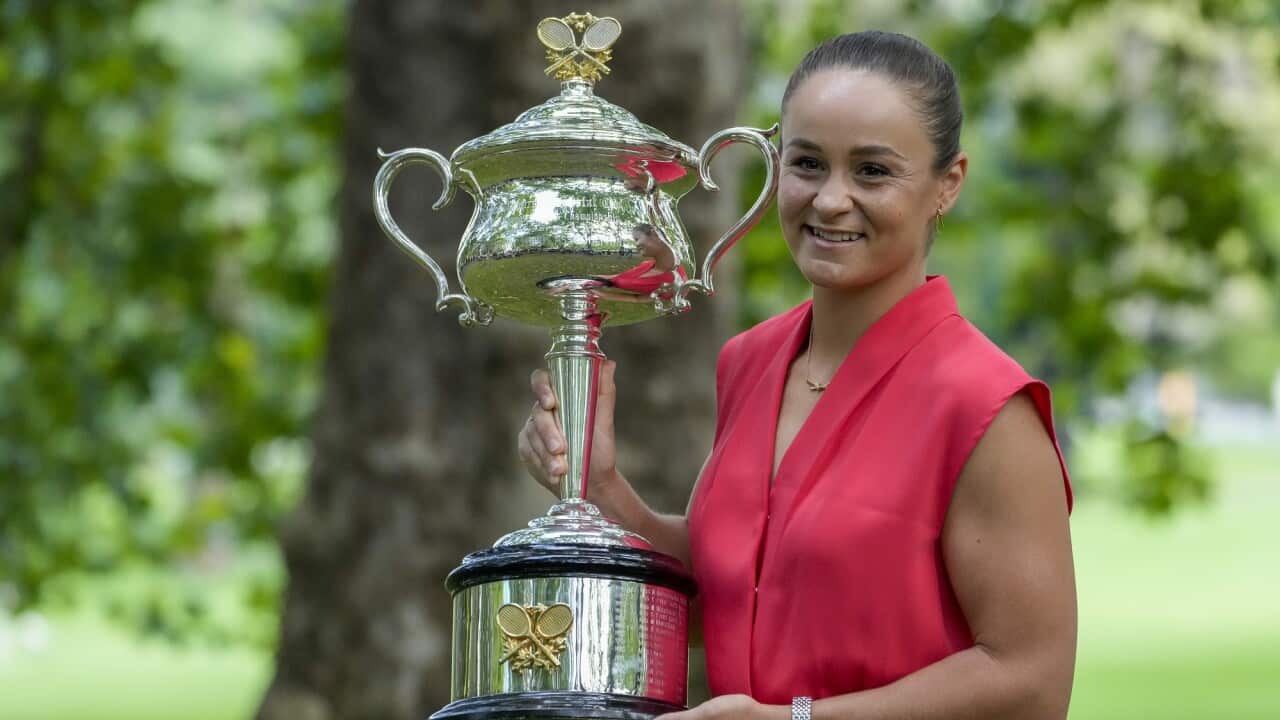 Ash Barty with the Daphne Akhurst Memorial Cup on Sunday 30 January 2022.