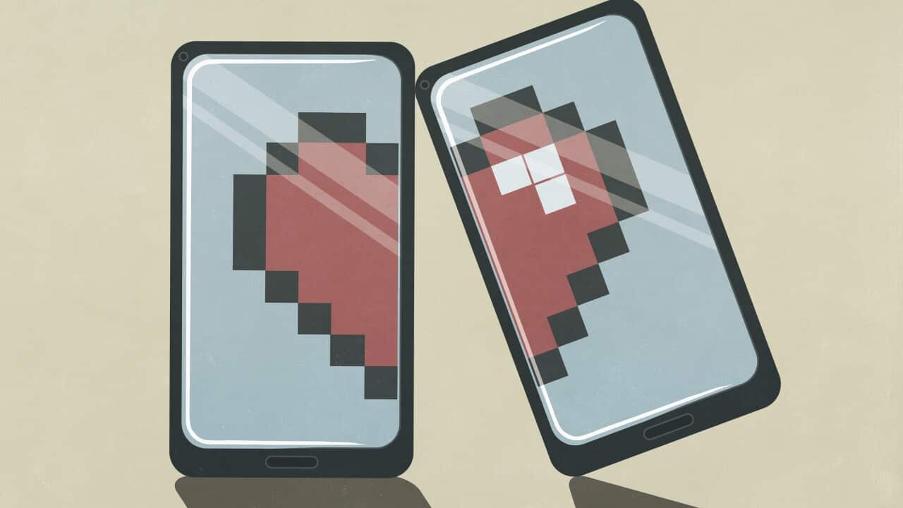 Pixelated broken heart on smart phone screens