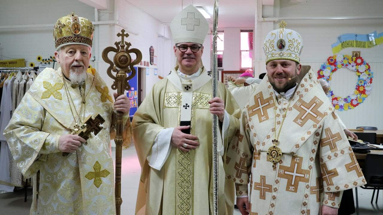 Bishop Peter Stasiuk, Melbourne Archbishop Peter Comensoli, Bishop Mykola Bychok.
