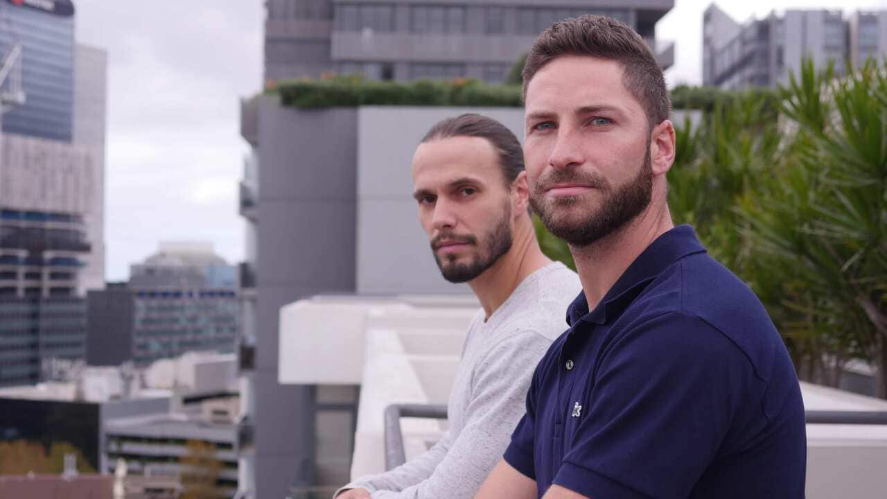 Two men on a balcony in Sydney