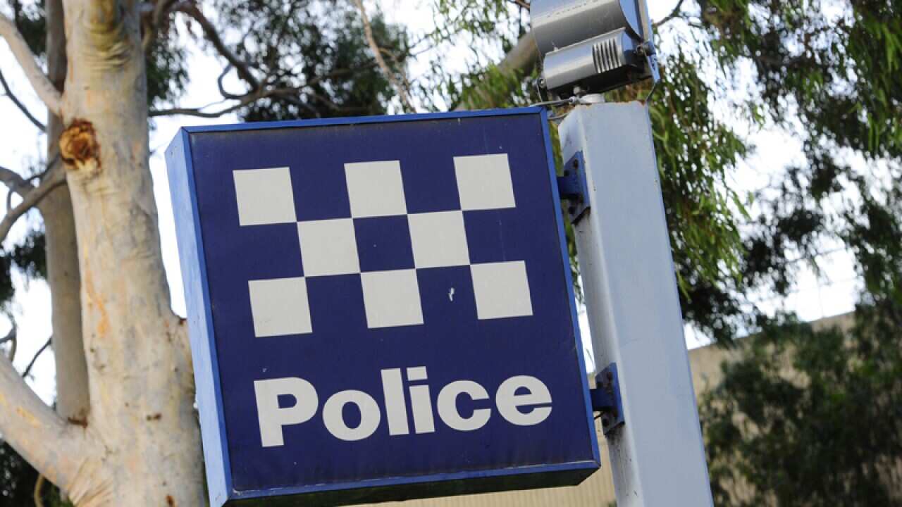 A police station sign