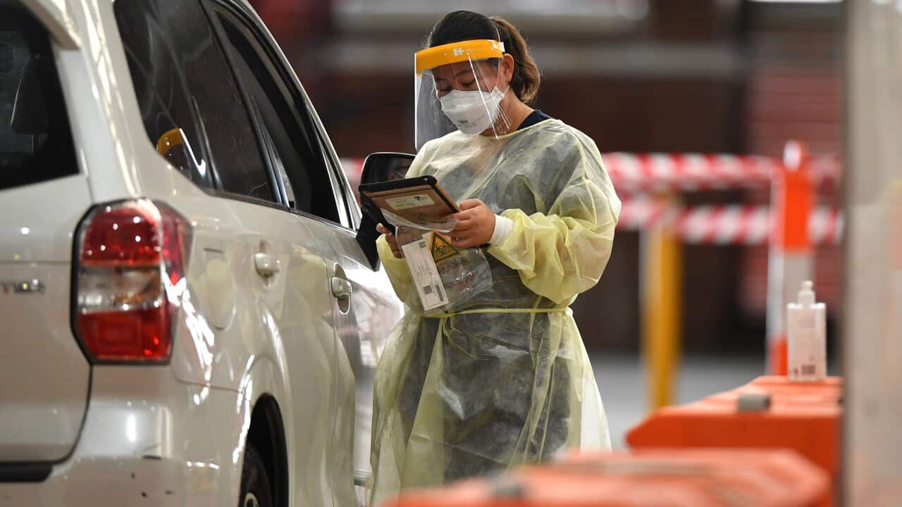 A health worker is seen at a COVID-19 testing centre in Melbourne.