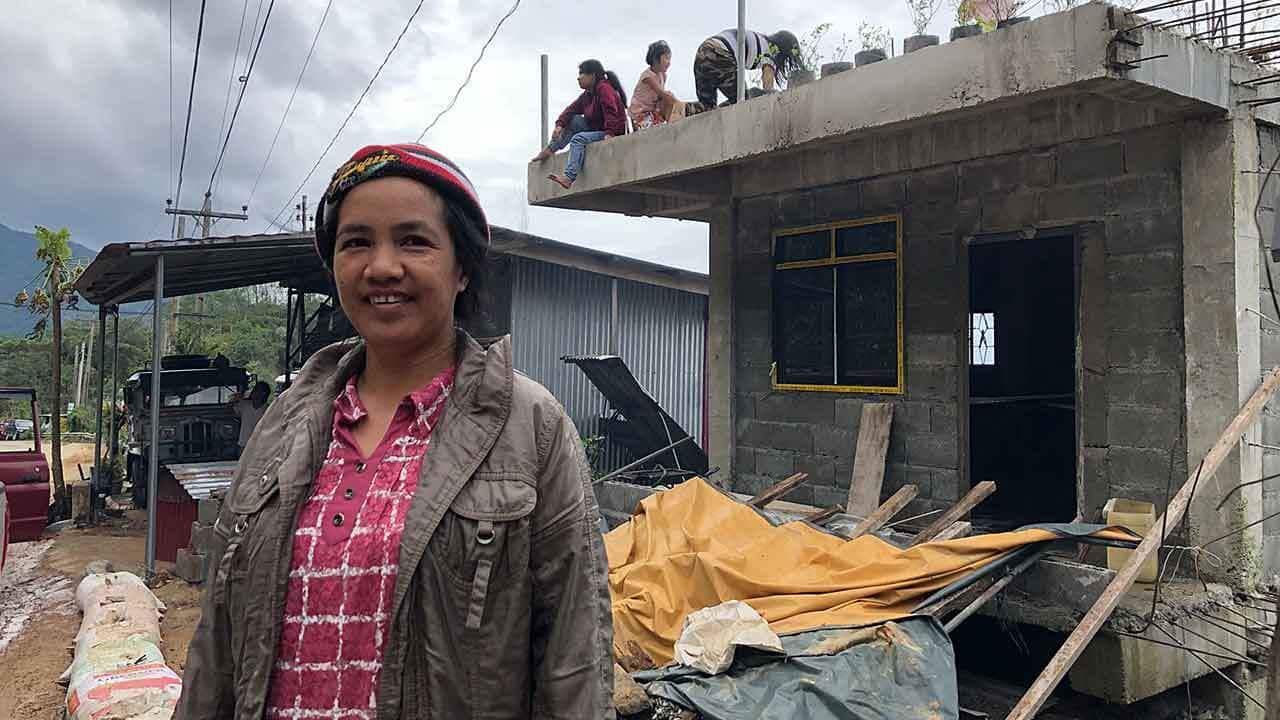 Benguet province: Families scrambled to safety after two landslides on either side of their homes blocked roads in the aftermath of Typhoon Mangkhut.