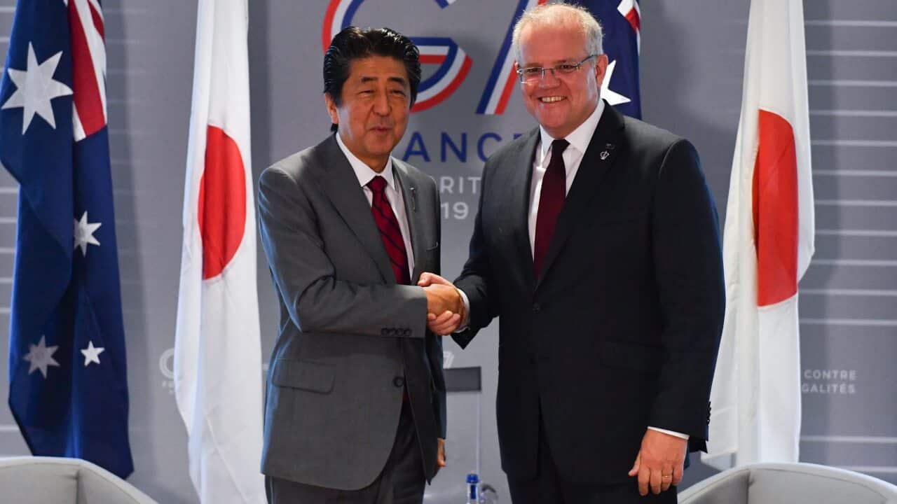 Shinzo Abe with Prime Minister Scott Morrison during the 2019 G7 Summit in France.