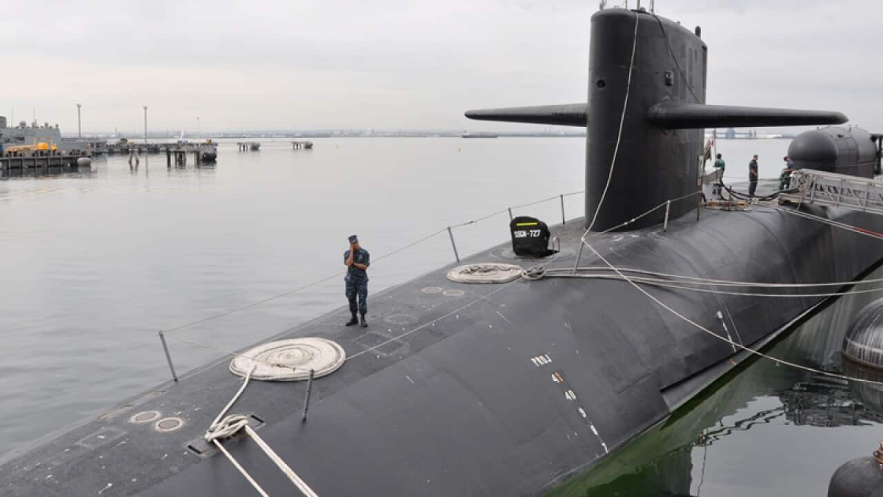 Japan pledges to build submarines in Australia.