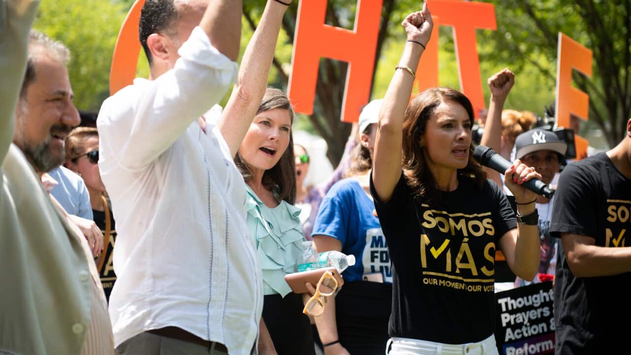 Mara Teresa Kumar leads a chant at the "Rally against White Supremacy" near the White House on August 6, 2019. 