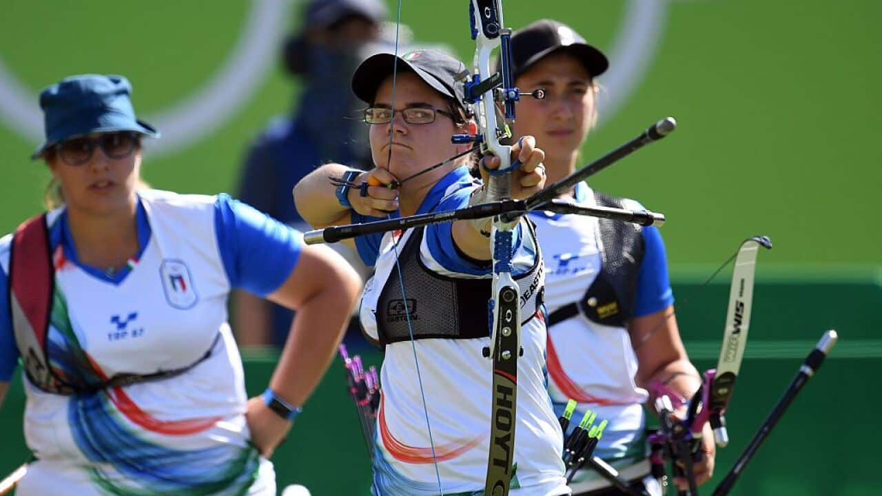 Italy's Lucilla Boari shoots an arrow during the Rio 2016 Olympic Games Women's Team competition against Brazil at the Sambodromo archery venue in Rio.