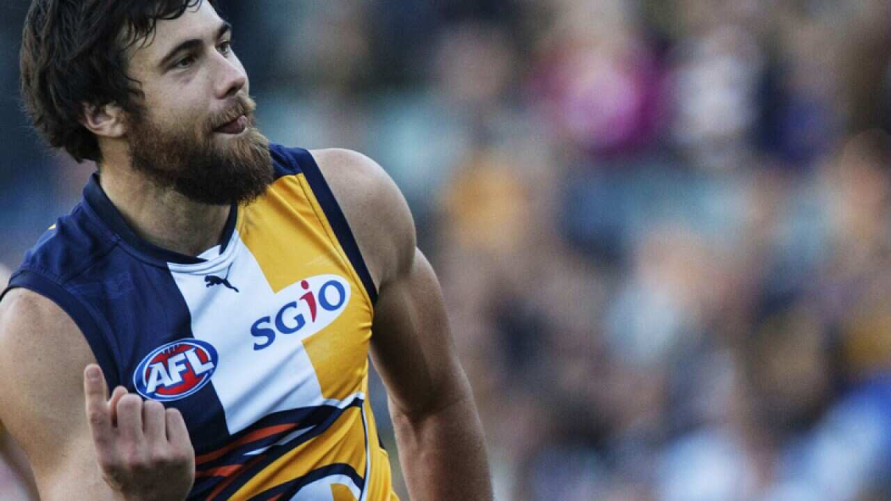 Forward Josh Kennedy reacts