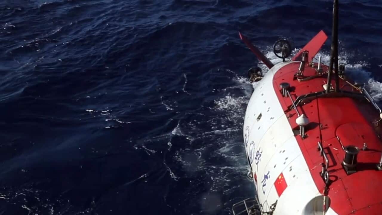 The Ocean Dragon going underwater.