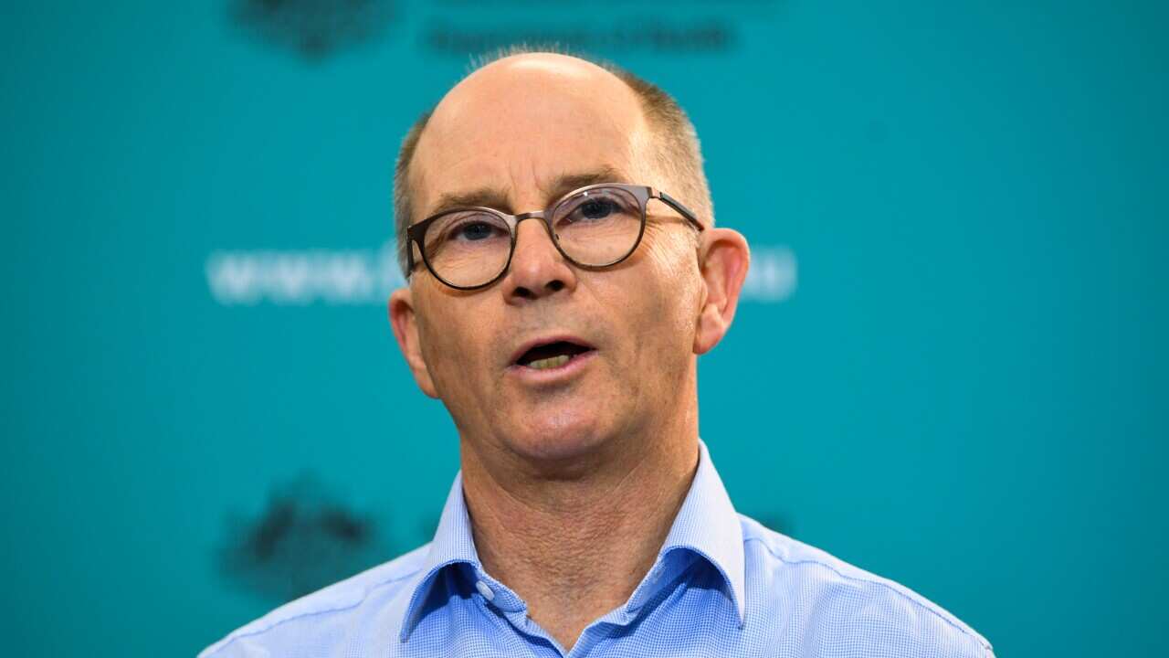 Deputy Chief Medical Officer Paul Kelly speaks to the media during a press conference