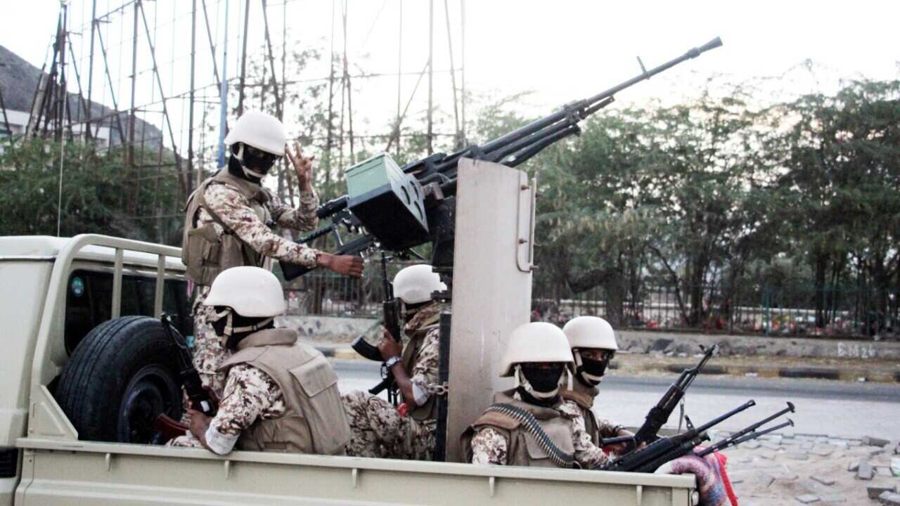 Armed supporters of the separatist Southern Movement patrol a street following clashes in the southern port city of Aden, Yemen, 28 January 2018.