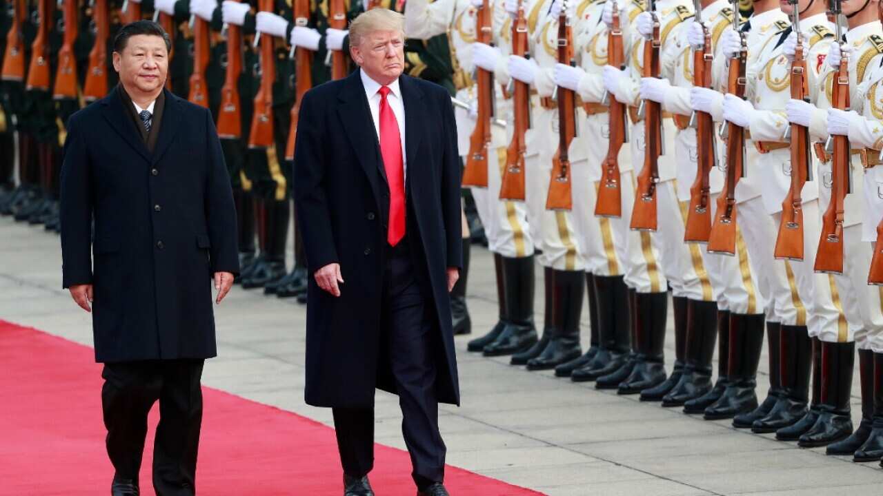 China threatens US with tariffs, says 'not afraid of trade war' | SBS News