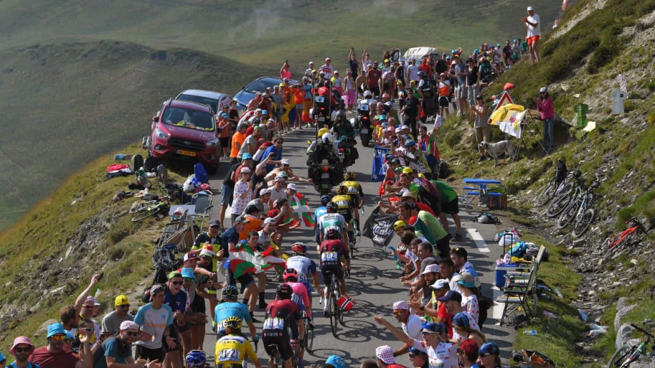 Fans line the climb on Stage 14 of the 2019 Tour de France