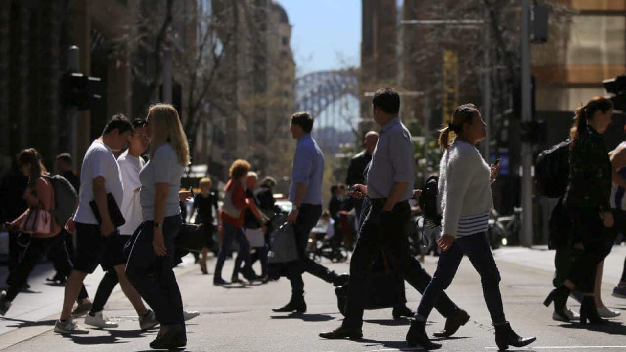 People walk on the streets of the CBD in Sydney, Wednesday, September 4, 2019