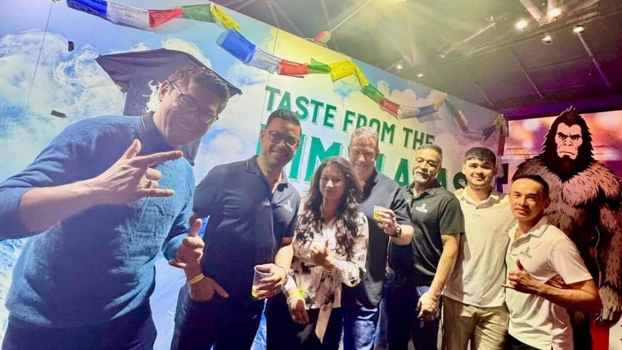 Dipesh Shrestha (third from right) is a director of a Sydney-based brewery.