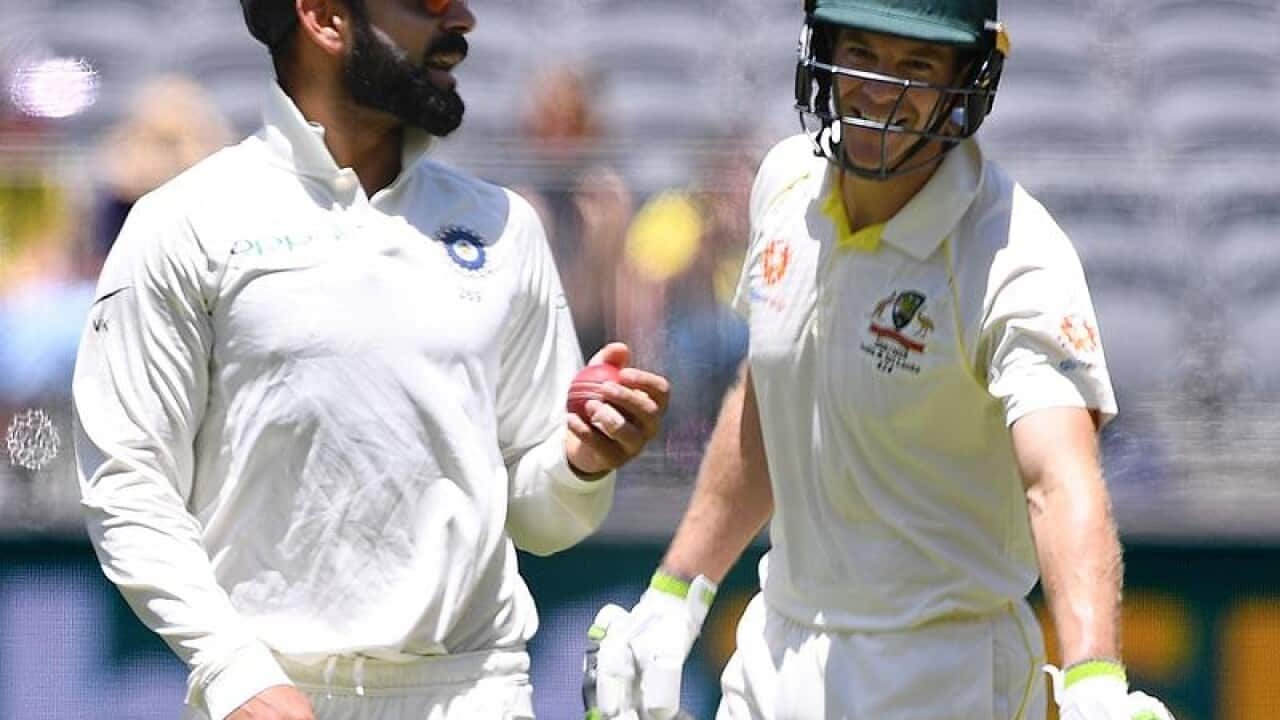 India cricket captain Virat Kohli (l) and Australia's Tim Paine