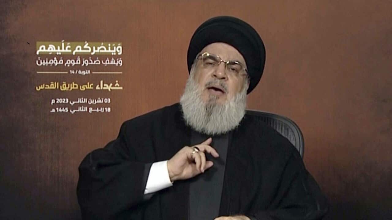 Hezbollah leader Sayyed Hassan Nasrallah gestures during the televised speech.
