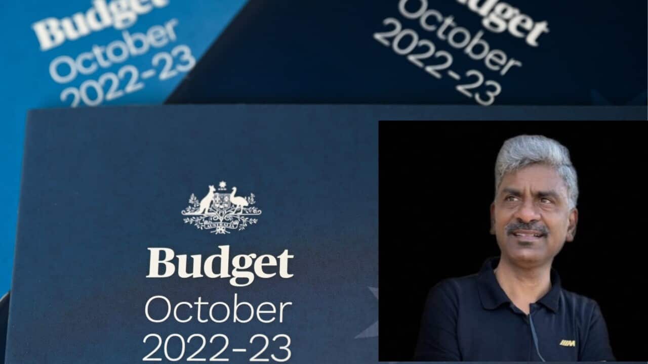 The 2022/23 Federal Budget papers are seen inside the Budget lockup at Parliament House in Canberra