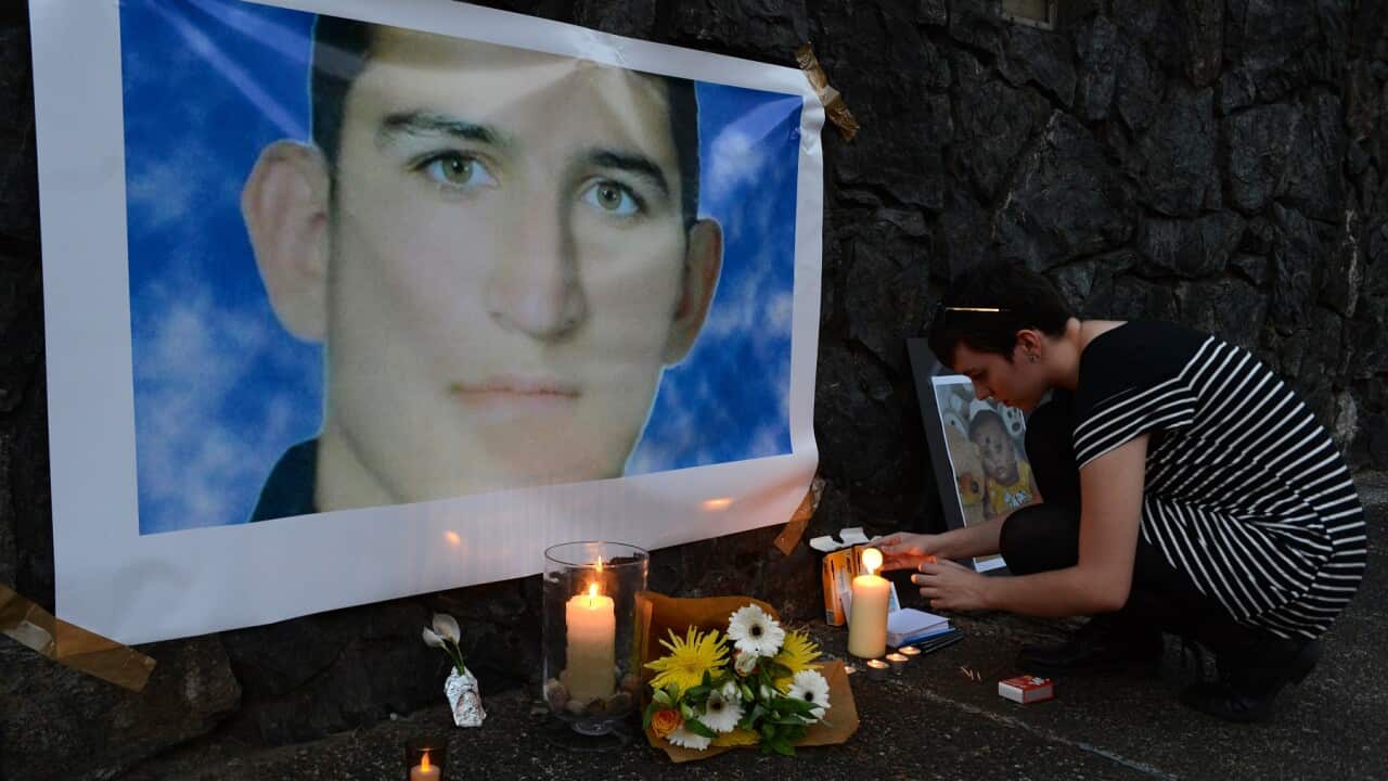 A shrine for Reza Berati at a 2014 vigil in support of asylum seekers in Brisbane