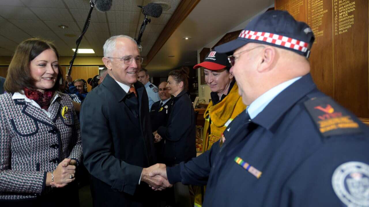 Minister Malcolm Turnbull greets volunteer firefighters