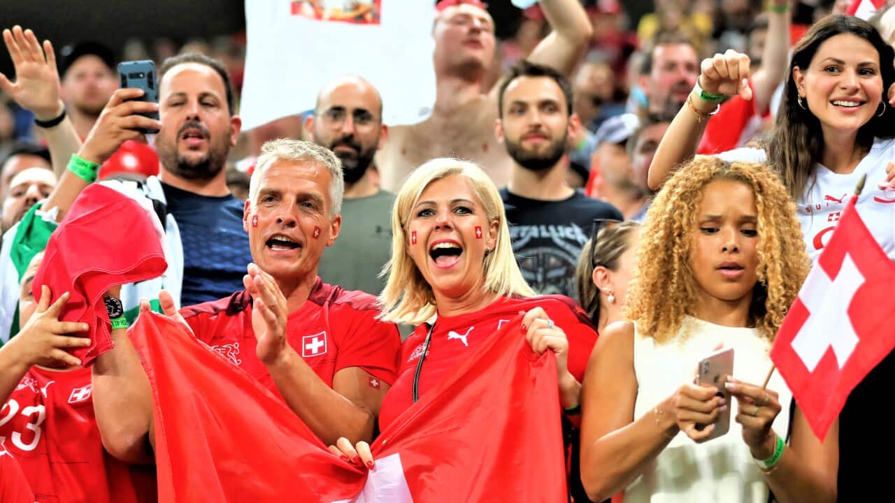 Switzerland fans react during the Euro 2020 soccer championship round of 16 match between France and Switzerland in Bucharest, Romania.